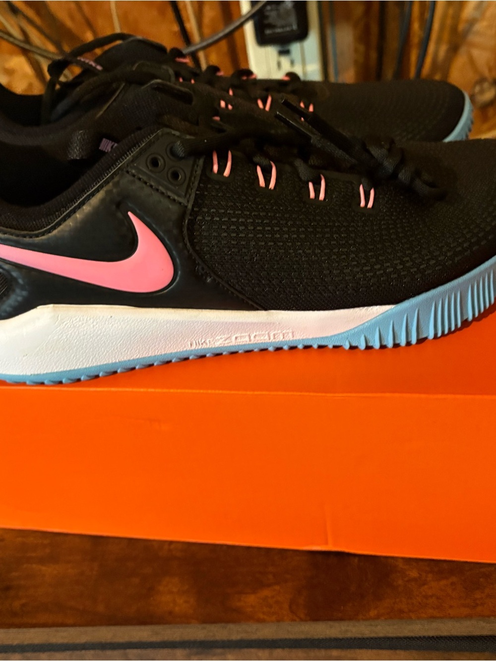 Nike Black Athletic Sneakers with Pink Swoosh and Blue Outsole